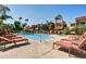 Relaxing community pool and spa with surrounding lounge chairs at 3500 N Hayden Rd # 1902, Scottsdale, AZ 85251