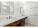 Bathroom with double vanity, marble countertop, and shower at 4340 E Nisbet Rd, Phoenix, AZ 85032