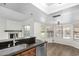 Kitchen with granite counters, stainless steel sink, and wood cabinets at 4340 E Nisbet Rd, Phoenix, AZ 85032