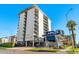 Modern mid-rise building with city views and palm trees at 805 N 4Th Ave # 609, Phoenix, AZ 85003