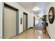 Building hallway with elevators and tiled floors at 805 N 4Th Ave # 609, Phoenix, AZ 85003