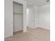 Carpeted bedroom with double door closet at 12337 W Marguerite Ave, Avondale, AZ 85323