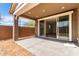 Covered patio with sliding glass doors and a view into the backyard at 12337 W Marguerite Ave, Avondale, AZ 85323