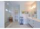 Elegant bathroom boasts a glass shower, double vanity, and stylish decor at 18169 W Cactus Flower W Dr, Goodyear, AZ 85338