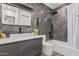 Modern bathroom with marble tile and floating vanity at 1825 W Ray Rd # 2060, Chandler, AZ 85224