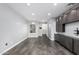 Modern living room with gray walls and dark gray vinyl flooring at 1825 W Ray Rd # 2060, Chandler, AZ 85224