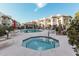 Community pool and spa with ample seating at 1825 W Ray Rd # 2060, Chandler, AZ 85224