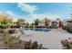 Community pool with plenty of lounge chairs at 1825 W Ray Rd # 2060, Chandler, AZ 85224