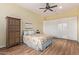 Guest bedroom with a full-size bed and built-in wardrobe at 20404 W Crescent Dr, Buckeye, AZ 85396