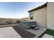 Modern hot tub on a stone patio at 20404 W Crescent Dr, Buckeye, AZ 85396