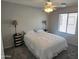 Comfortable bedroom with ceiling fan and nightstands at 2101 S Meridian Rd # 274, Apache Junction, AZ 85120