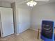 Spacious bedroom with double doors and a ceiling fan at 2101 S Meridian Rd # 274, Apache Junction, AZ 85120