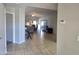 Bright and spacious entryway with tile flooring, leading to the living room at 2101 S Meridian Rd # 274, Apache Junction, AZ 85120