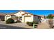 Delightful single-story home with two-car garage, tidy desert landscaping, and a white picket fence at 2101 S Meridian Rd # 274, Apache Junction, AZ 85120