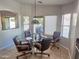 Kitchen breakfast nook with a glass-top table and four chairs at 2101 S Meridian Rd # 274, Apache Junction, AZ 85120