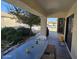 Covered patio with seating area and backyard view at 2101 S Meridian Rd # 274, Apache Junction, AZ 85120