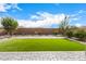 Landscaped backyard with artificial turf and gravel at 2837 W Minton St, Phoenix, AZ 85041