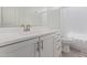 Bathroom with toilet, vanity with silver hardware and neutral tile floors at 2837 W Minton St, Phoenix, AZ 85041