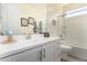 Modern bathroom with a single vanity and bathtub at 2837 W Minton St, Phoenix, AZ 85041