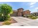 Charming single-Gathering home with a brick facade, a two-car garage, and a well-maintained front yard at 2837 W Minton St, Phoenix, AZ 85041