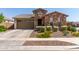 Inviting single-Gathering home boasting a brick exterior, a two-car garage, and manicured landscaping at 2837 W Minton St, Phoenix, AZ 85041