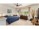 Large main bedroom with a comfortable king-size bed and plenty of natural light at 2837 W Minton St, Phoenix, AZ 85041