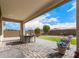 Covered patio overlooking a grassy backyard at 2837 W Minton St, Phoenix, AZ 85041