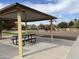 Relaxing picnic area with shaded tables and benches near playground at 2837 W Minton St, Phoenix, AZ 85041