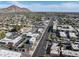 Aerial view of a city street with buildings and landscape at 4034 E Osborn Rd, Phoenix, AZ 85018