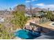 Elevated view of house and refreshing blue pool at 4034 E Osborn Rd, Phoenix, AZ 85018