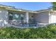 Covered patio with seating area and landscaping at 4034 E Osborn Rd, Phoenix, AZ 85018