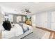 Main bedroom with king bed, hardwood floors and large windows at 4034 E Osborn Rd, Phoenix, AZ 85018