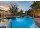 Relaxing pool and spa with a waterfall feature at 4034 E Osborn Rd, Phoenix, AZ 85018