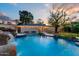 Stunning pool with waterfall and a relaxing atmosphere at 4034 E Osborn Rd, Phoenix, AZ 85018