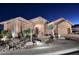 Night view of a beautiful home with desert landscaping at 6217 E Sienna Bouquet Pl, Cave Creek, AZ 85331