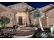 Stunning desert landscape surrounds this home's exterior at night at 6217 E Sienna Bouquet Pl, Cave Creek, AZ 85331