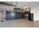 Organized garage with built-in cabinetry and overhead storage at 6217 E Sienna Bouquet Pl, Cave Creek, AZ 85331