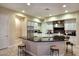 Island kitchen with granite countertops and stainless steel appliances at 6217 E Sienna Bouquet Pl, Cave Creek, AZ 85331