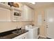 Laundry room with sink, cabinets, and washer/dryer hookups at 6217 E Sienna Bouquet Pl, Cave Creek, AZ 85331