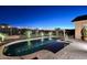 Inviting pool area with lighting and beautiful desert landscaping at 6217 E Sienna Bouquet Pl, Cave Creek, AZ 85331