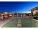 Relaxing backyard oasis with a sparkling pool and artificial turf at 6217 E Sienna Bouquet Pl, Cave Creek, AZ 85331