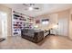 Cozy bedroom with a comfy tufted couch and built-in shelving at 755 W 2Nd St, Mesa, AZ 85201