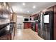 Modern kitchen with stainless steel appliances and granite counters at 755 W 2Nd St, Mesa, AZ 85201