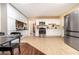 Modern kitchen with white cabinets, stainless steel appliances and tile flooring at 755 W 2Nd St, Mesa, AZ 85201