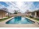 Inviting kidney-shaped pool in a sunny backyard at 755 W 2Nd St, Mesa, AZ 85201