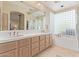 Elegant bathroom with double sinks, a soaking tub and shower at 8062 E Cortez Dr, Scottsdale, AZ 85260