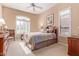 Well-lit guest bedroom with a queen bed and window at 8062 E Cortez Dr, Scottsdale, AZ 85260