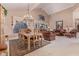 Formal dining area with a large table, chandelier, and access to the living room at 8062 E Cortez Dr, Scottsdale, AZ 85260