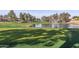 Expansive green golf course with a lake and trees at 8062 E Cortez Dr, Scottsdale, AZ 85260