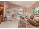 Open living space with a view into the kitchen and comfortable seating at 8062 E Cortez Dr, Scottsdale, AZ 85260